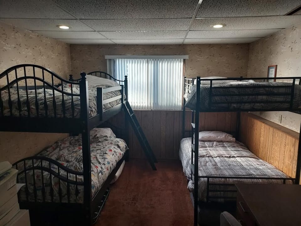 Bdrm #5 has 2 Bunk beds with warm comforters - desk + copy machine 