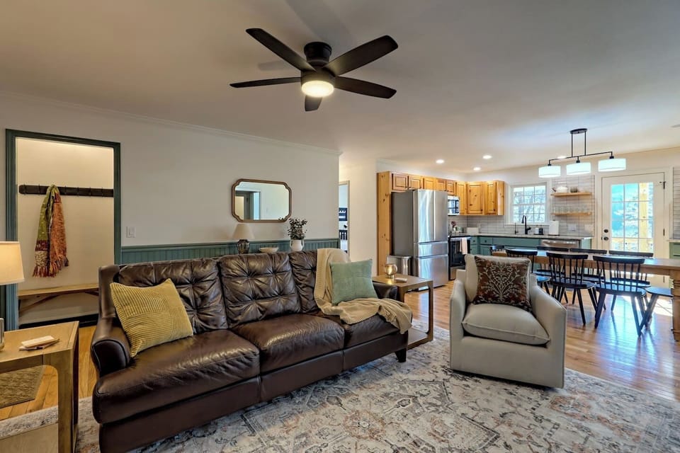 Open-concept main floor living space flowing seamlessly into the kitchen and dining area — designed for connection 🛋️