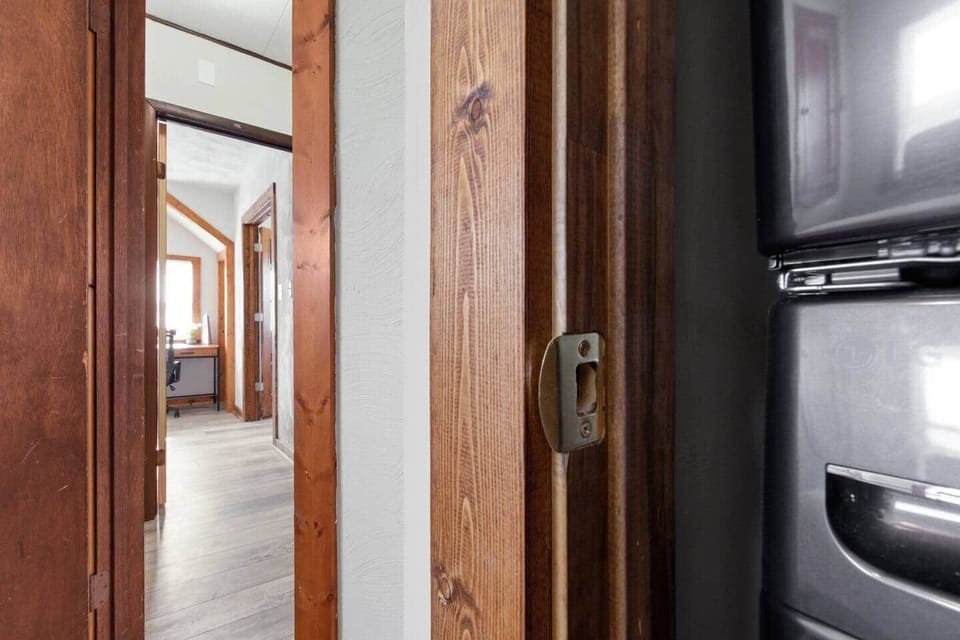 A stackable washer and dryer are conveniently located on the second floor in one of the bedrooms.