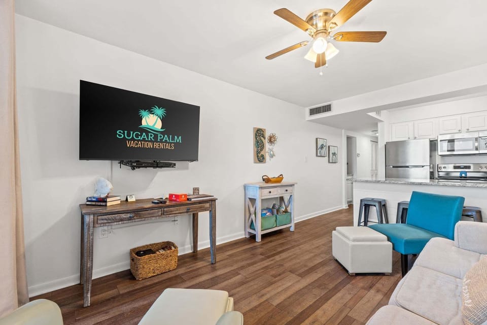 Wide view of the open living space flowing into the kitchen—bright, airy, and designed for comfort.