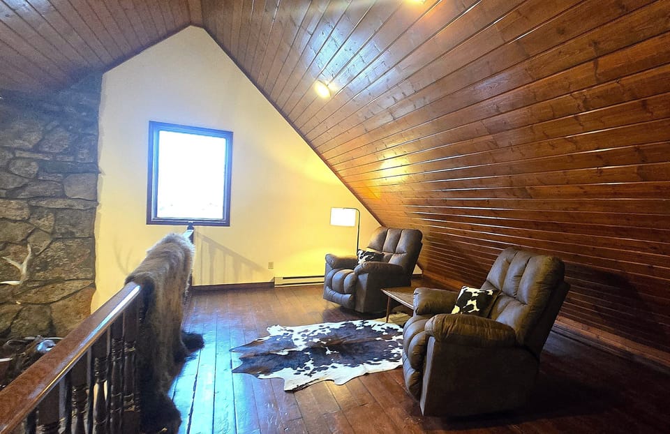 Upstairs, you'll find a cozy loft