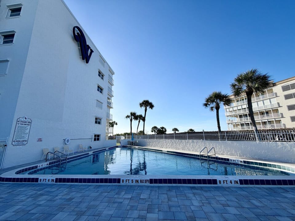 Private community setting with easy access to both pool and beach.