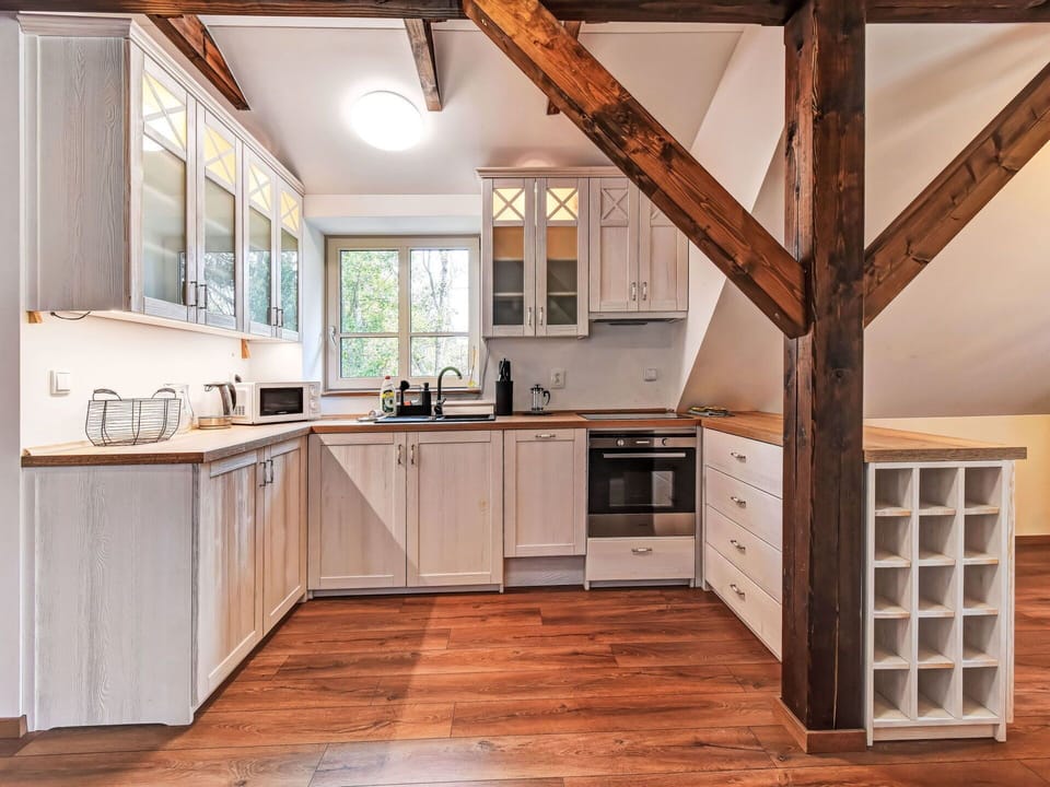 Flooring, Interior Design, Kitchen, Wood, Wood Flooring, Floor, Ceiling, Countertop, Cabinetry, Furniture