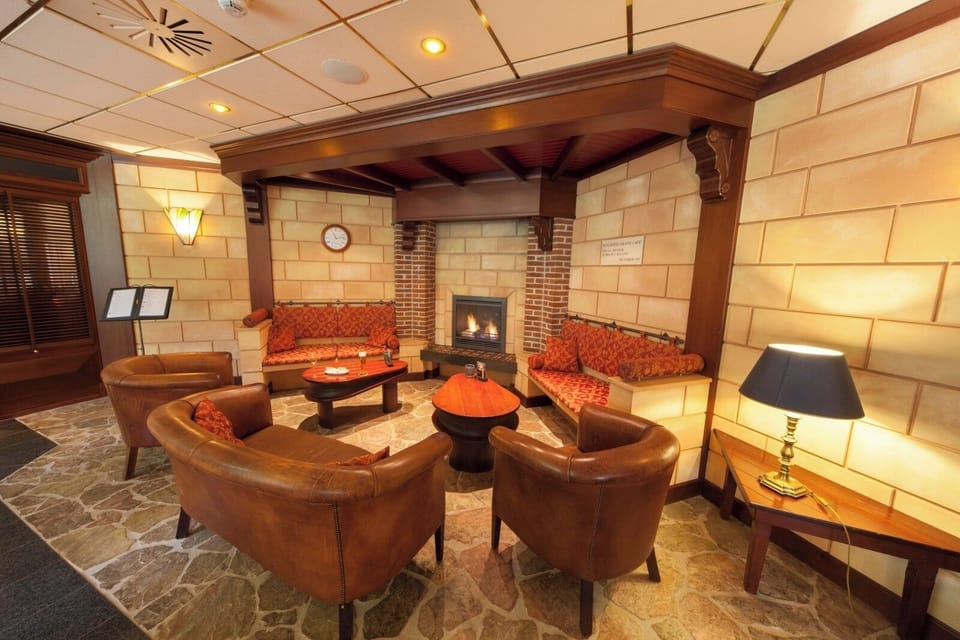 Curl up in leather chairs beside a crackling fireplace.