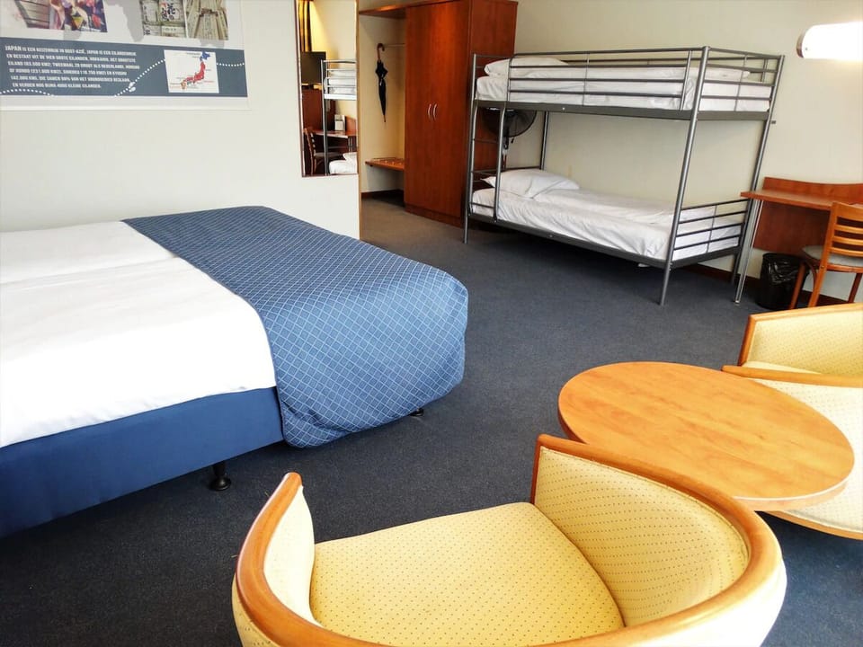 Kick back in a roomy layout with seating and practical storage.