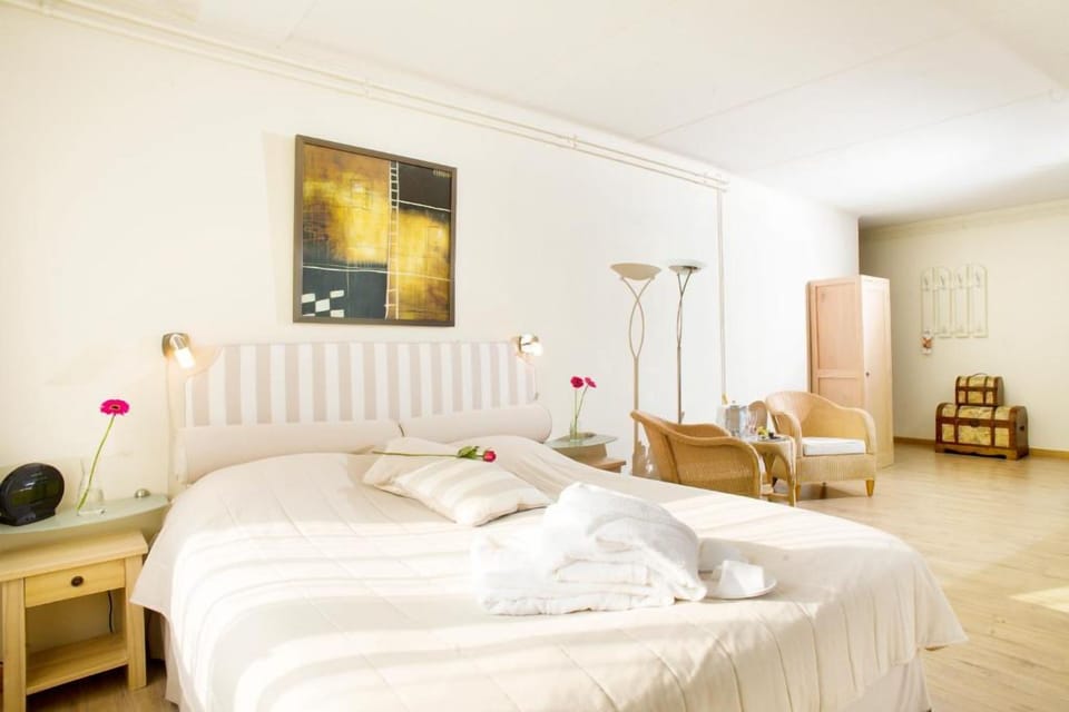 Sink into a sunlit room with airy, relaxing comfort.