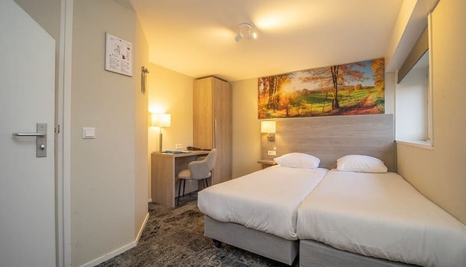 Unit with 3 Single Beds. Exact unit will be assigned upon arrival. Views, colors, and decor may vary.