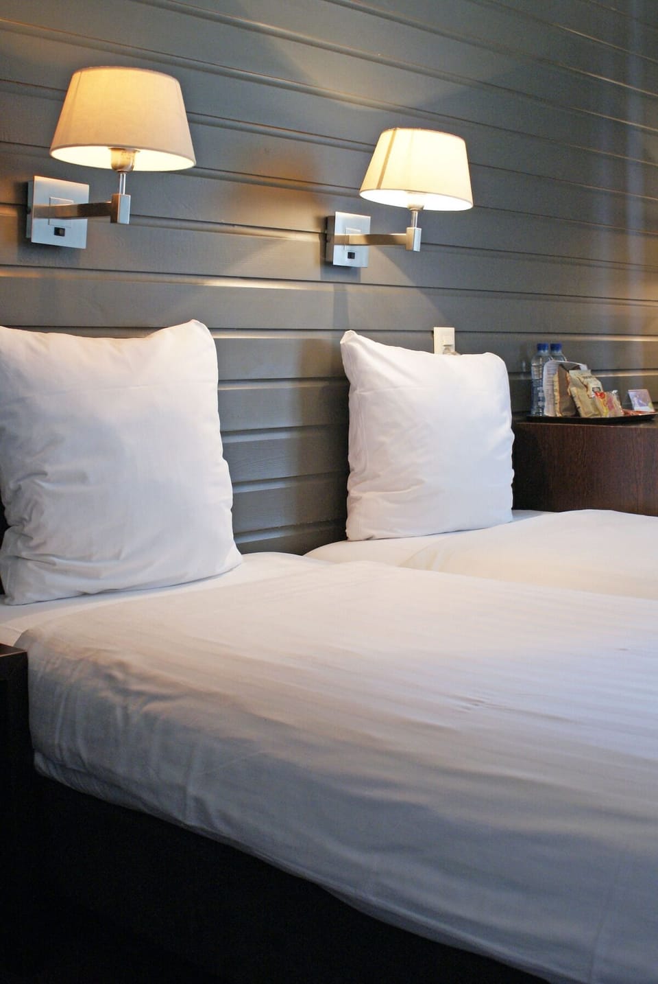 Unit with 2 Single Beds. Exact unit will be assigned upon arrival. Views, colors, and decor may vary.