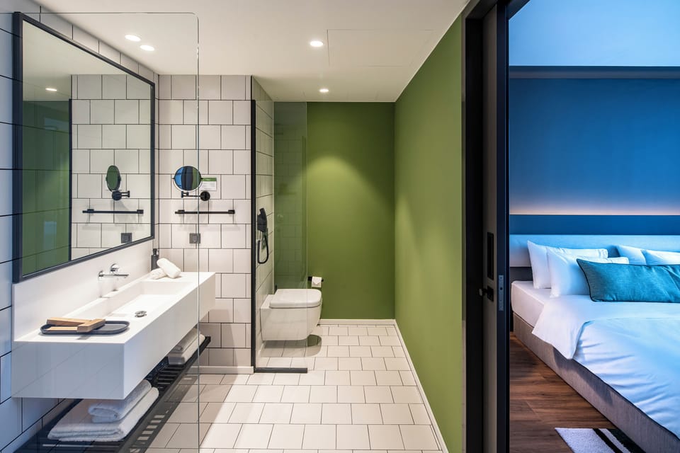 Refresh in a spacious, modern bathroom with spa-like finishes.
