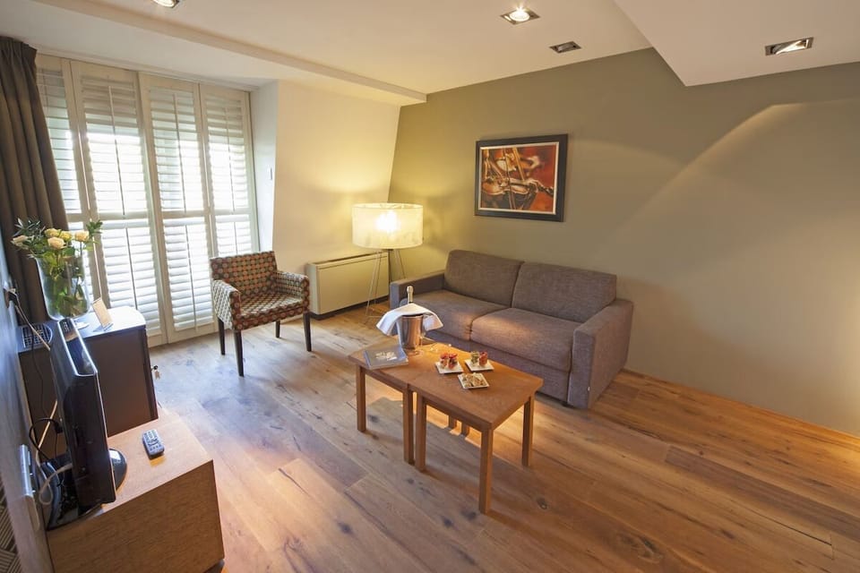 Stretch out on the sofa and savor in-room comfort.