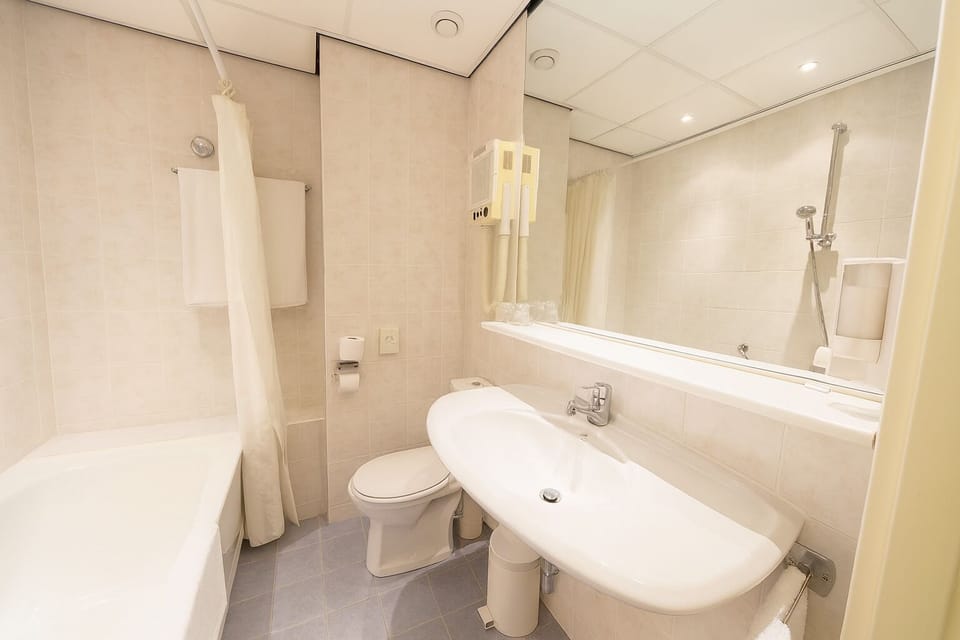 Refresh each morning in a spotless bathroom with walk-in shower.