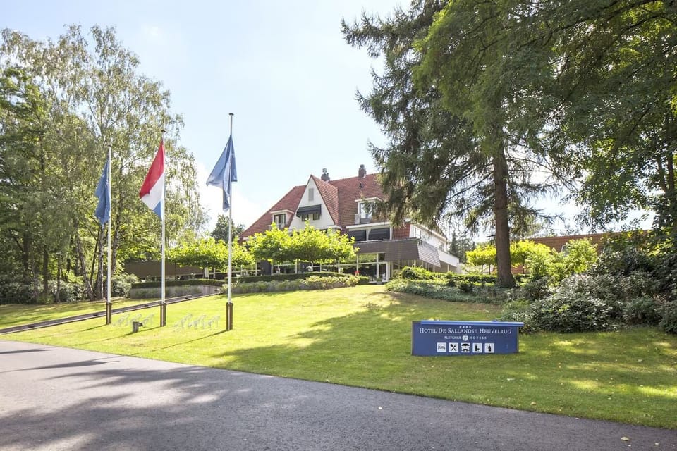 Arrive to a welcoming hotel setting surrounded by tranquil greenery.