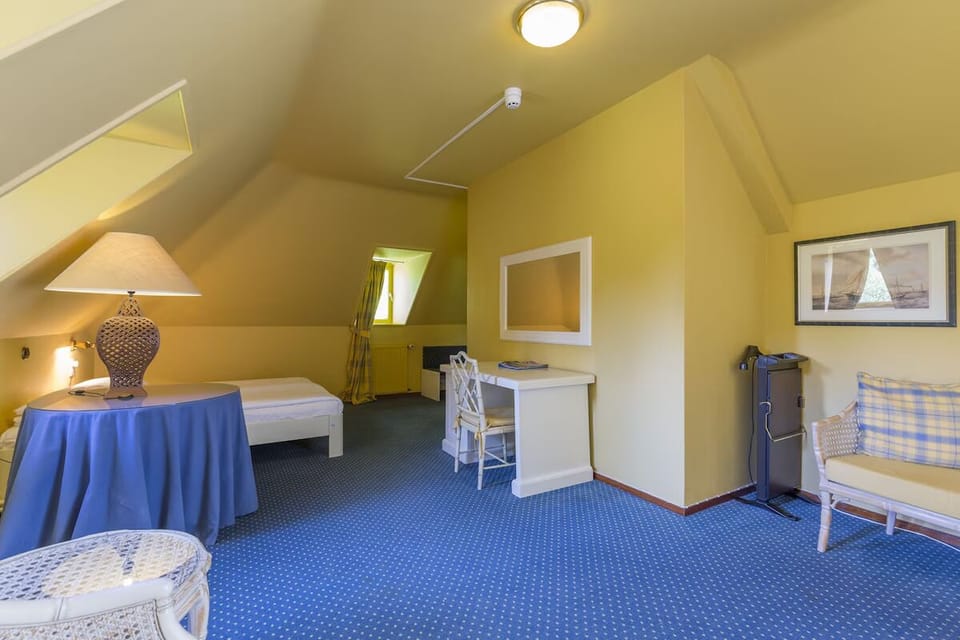 Unit with 2 Single beds. Exact unit will be assigned upon arrival. Views, colors, and decor may vary.