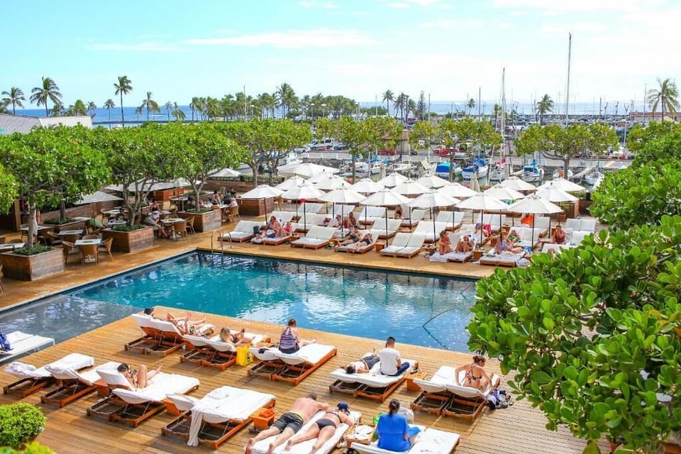 Soak up the lively pool atmosphere with marina breezes.
