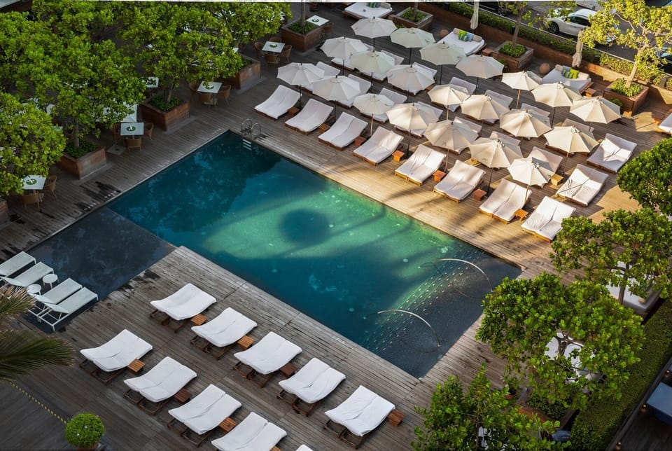 Float into calm while loungers and umbrellas await you.