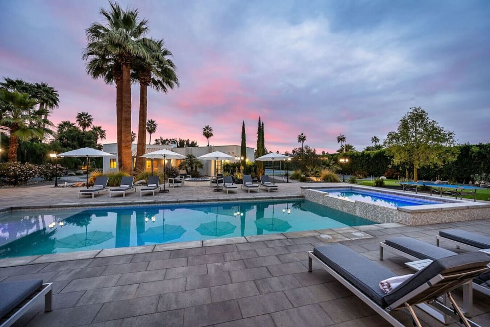 Pool: expansive pool & spa, 12 sun loungers, side tables, 4 patio umbrellas, 2 natural gas fire pit with additional seating