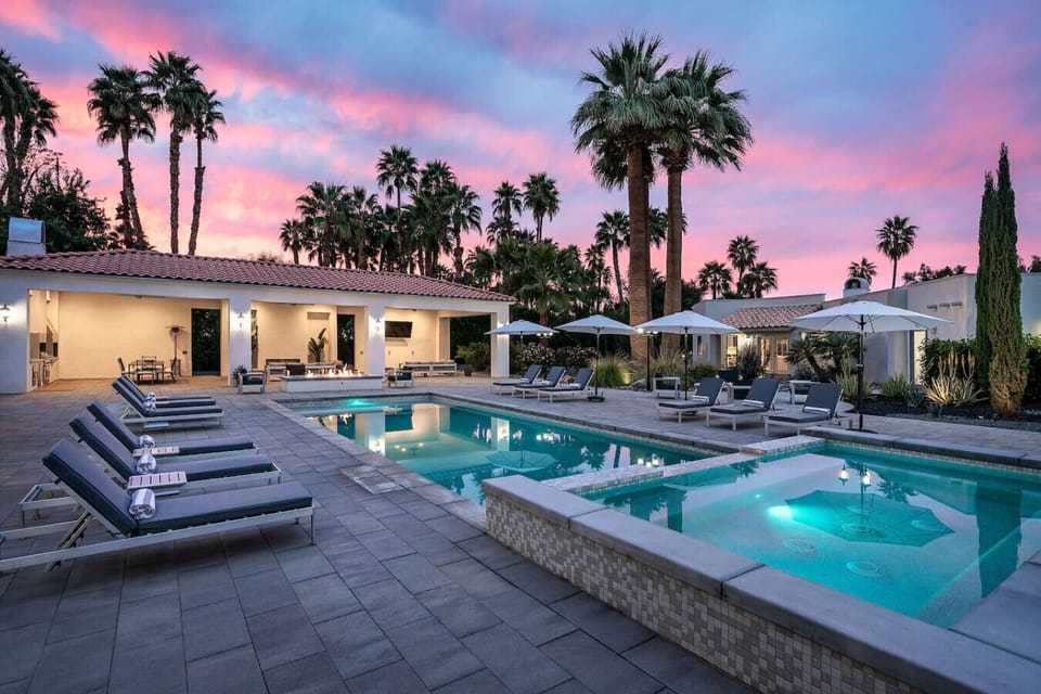 Pool: expansive pool & spa, 12 sun loungers, side tables, 4 patio umbrellas, 2 natural gas fire pit with additional seating