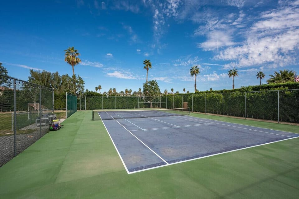 Tennis & Field: Full size tennis court with seating for 3, soccer field with 3 goal posts