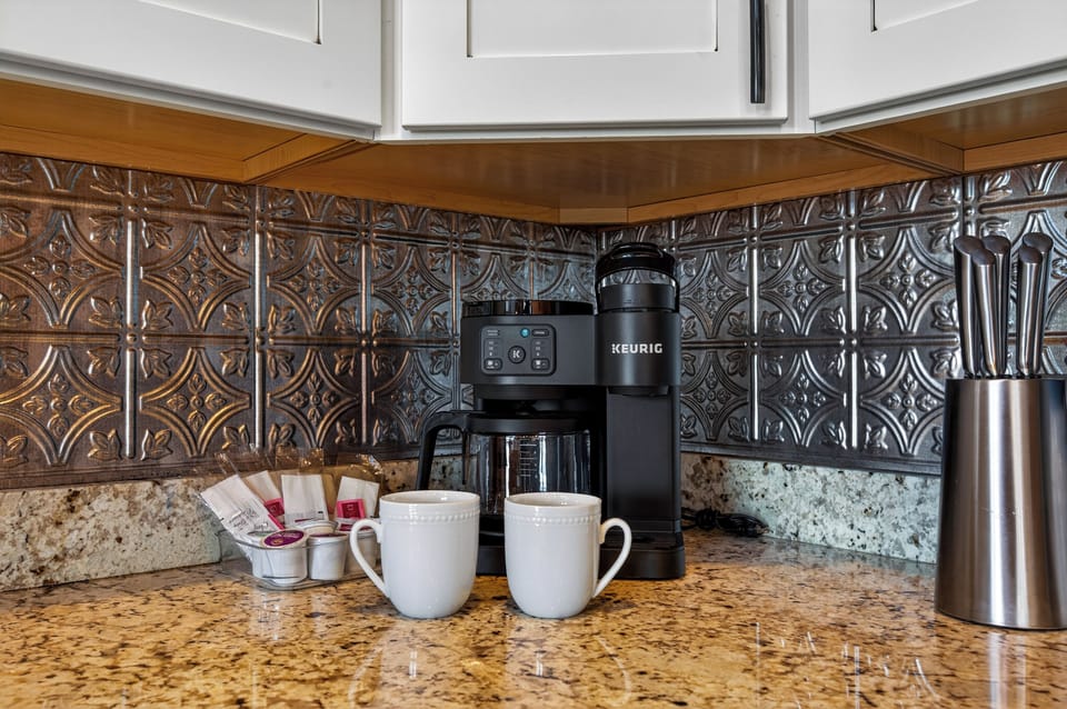 Keurig coffee station, mugs, complimentary starter K-cups to start the mornings.