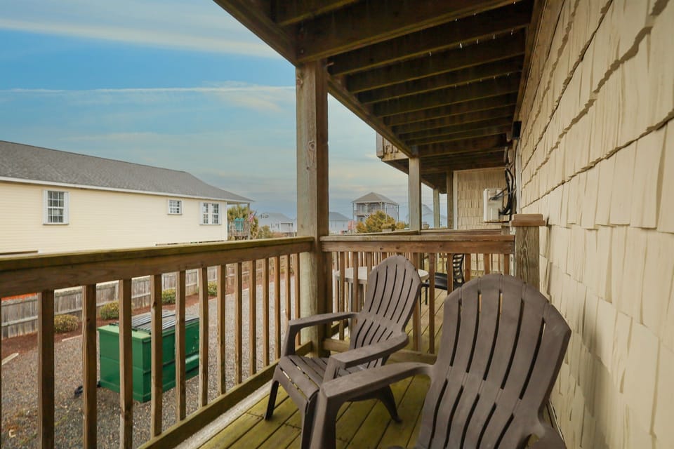 Private balcony with outdoor seating and open views for relaxing moments