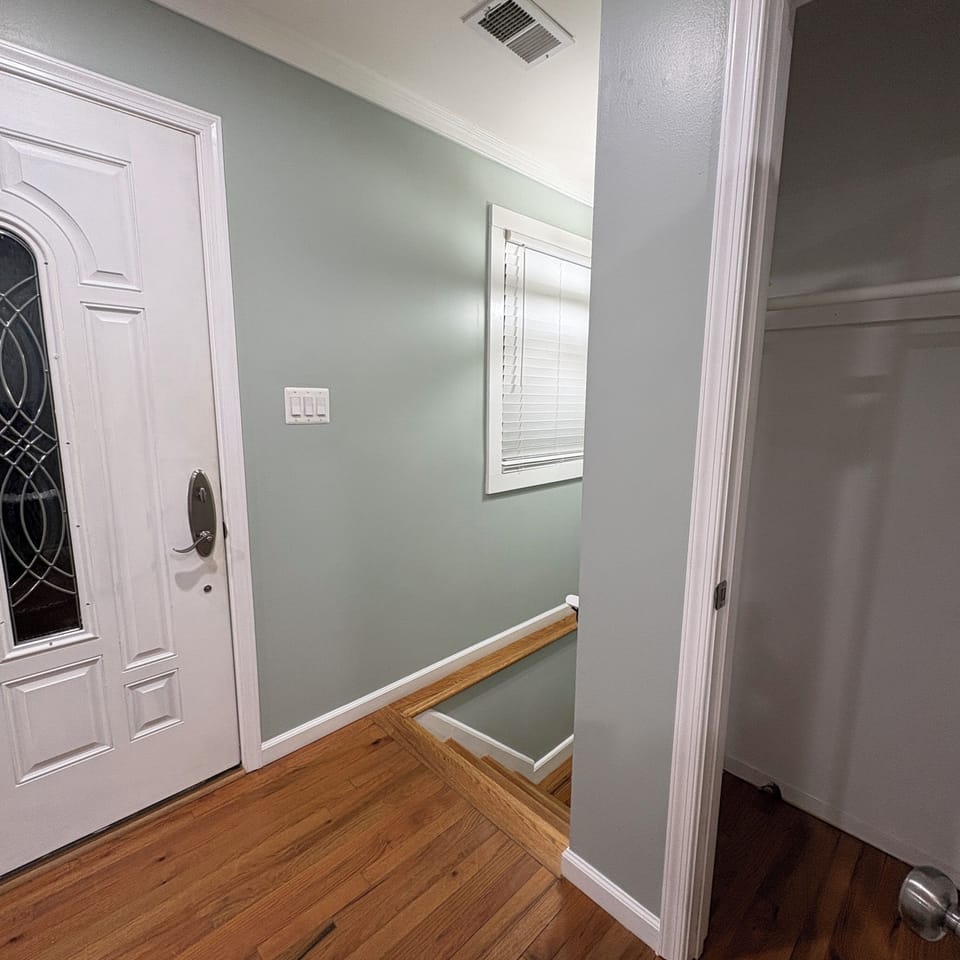 Living room entrance and coat closet