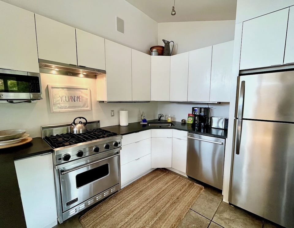 Kitchen has access to porch