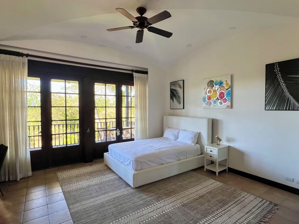 View of the bedroom leasing onto the terrace