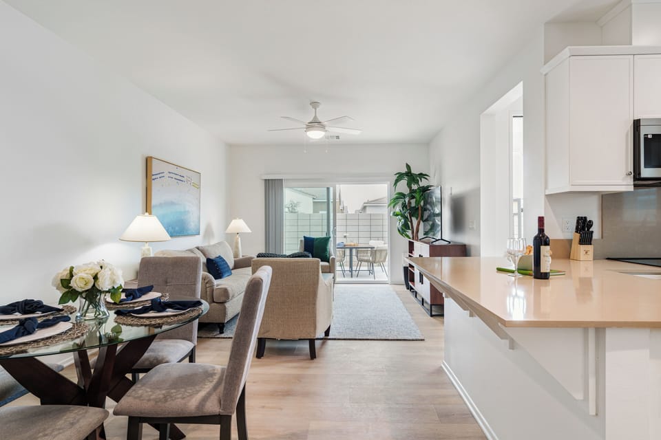 The perfect flow for entertaining, from the kitchen island to the sunny patio.