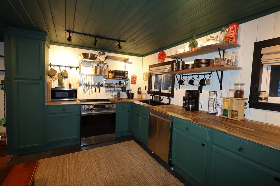 Our modern, updated kitchen has everything you need including a dishwasher, fridge, range, and more!