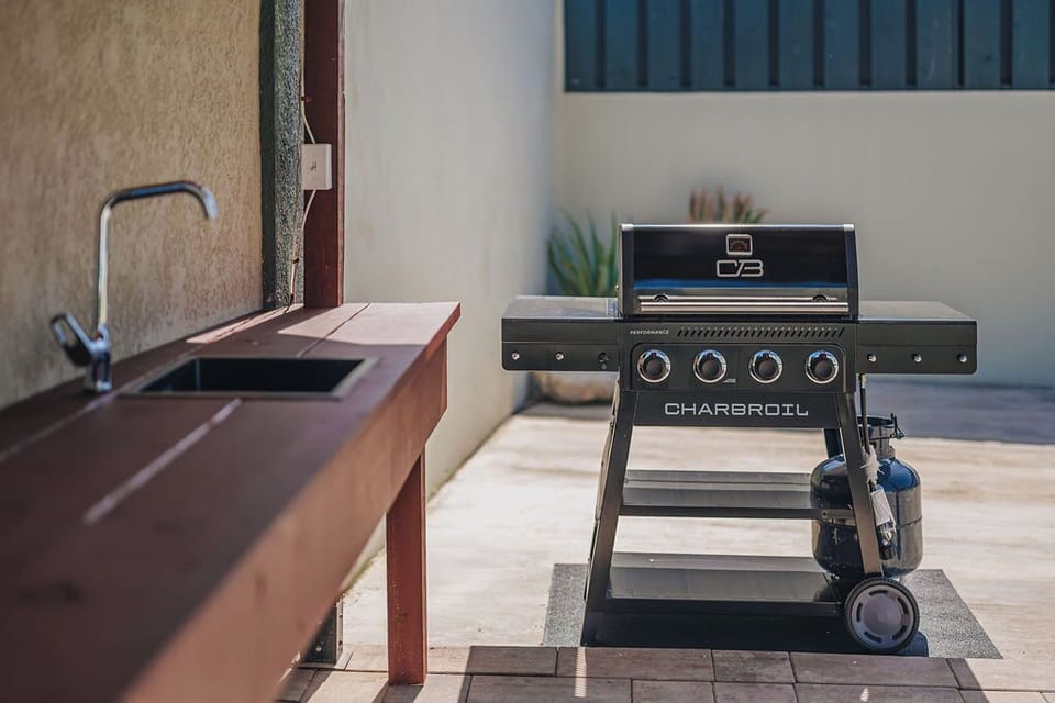 Fire up the grill and enjoy effortless outdoor cooking at Villa Cascada’s private BBQ station.