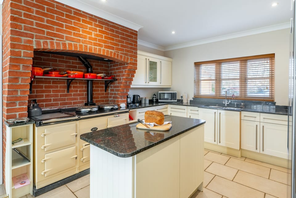 Ground floor: Kitchen / breakfast room with oil-fired Aga, combination microwave that has a grill / oven function, large fridge/freezer, dishwashers, coffee machine and a full inventory of table and kitchenware and breakfast table for six people