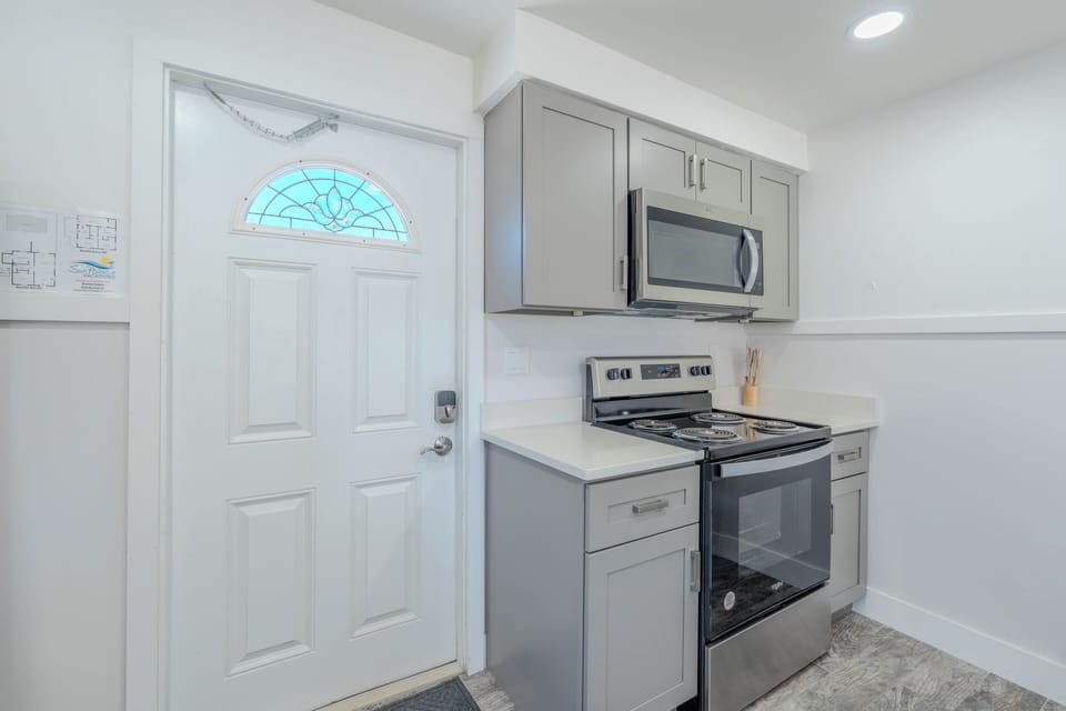 Lower-Level Entryway and kitchen.