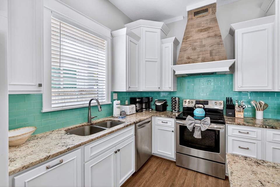 1st Floor - Spacious gourmet kitchen fully stocked with all the cookware and essentials the family chef needs. Enjoy modern appliances, generous prep space, and an open layout perfect for preparing meals, hosting gatherings, and entertaining with ease.