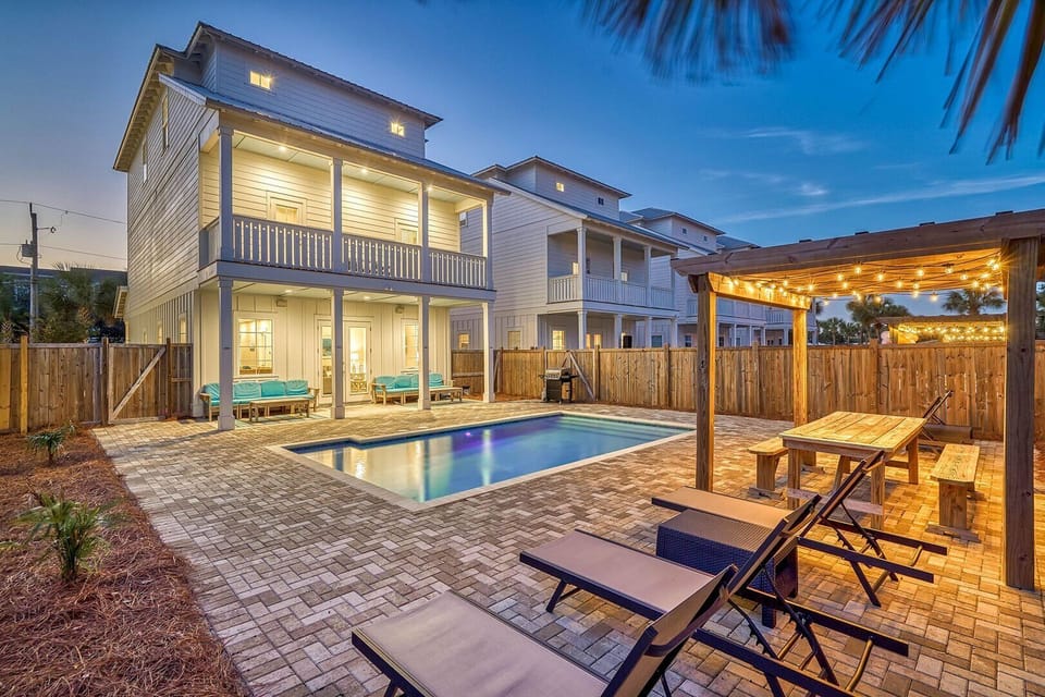Tipsy Turtle | Sleeps 28 in Miramar Beach! Just 1 minute to the beach with a FREE 6-seat golf cart. Private HEATED pool, outdoor kitchen, fire pit, and game room make this the ultimate Destin group getaway near Sandestin & 30A. Book your beach escape today
