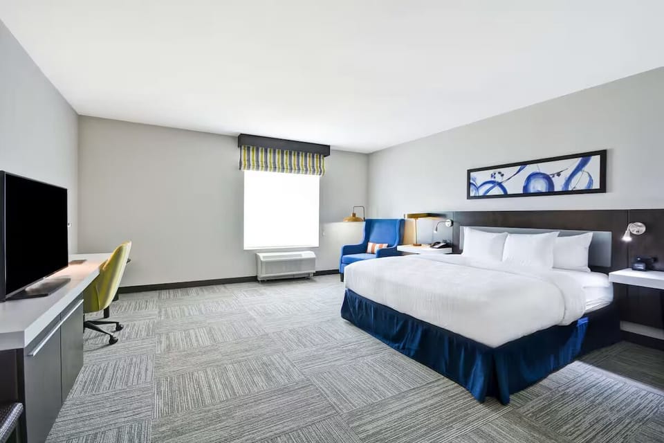 Stretch out on the plush king bed for a restorative sleep.
