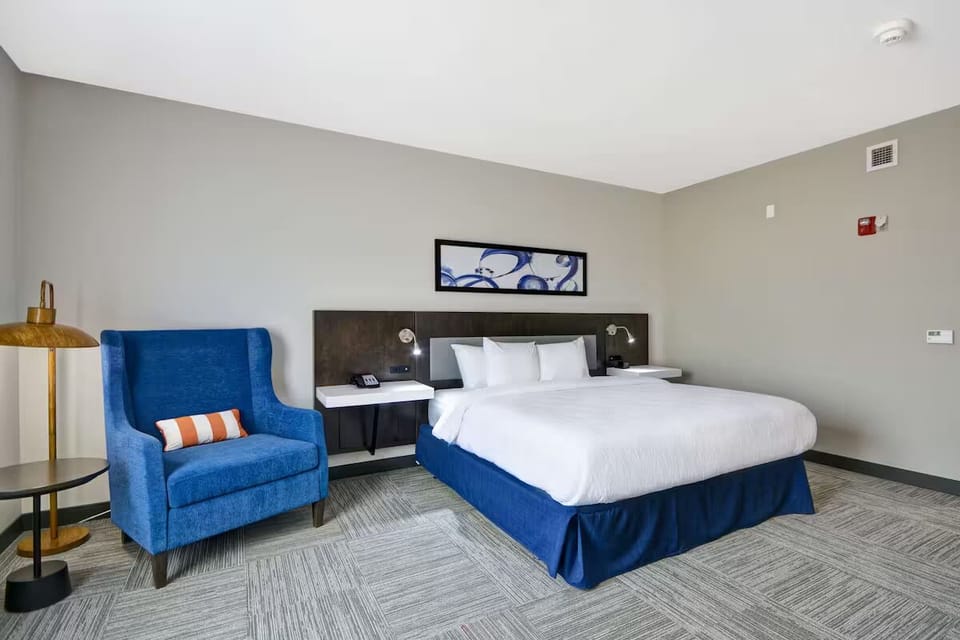 Drift off in serene king-bed comfort with calming modern décor.