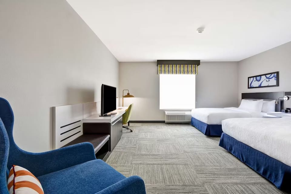 Kick back in the cozy seating area beside your spacious room.