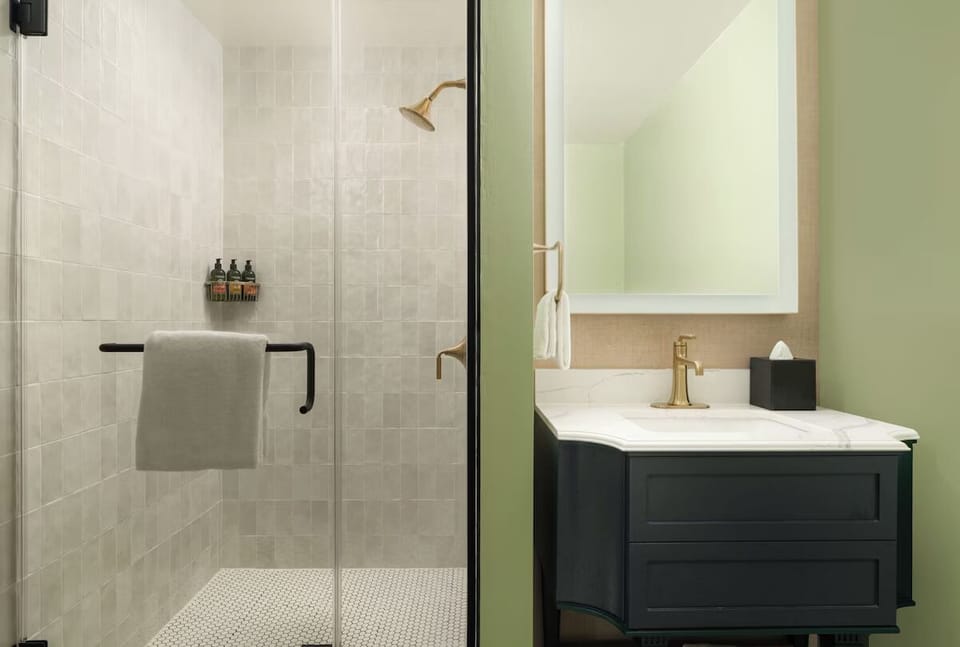 Refresh in a sleek walk-in shower with spa-like finishes.