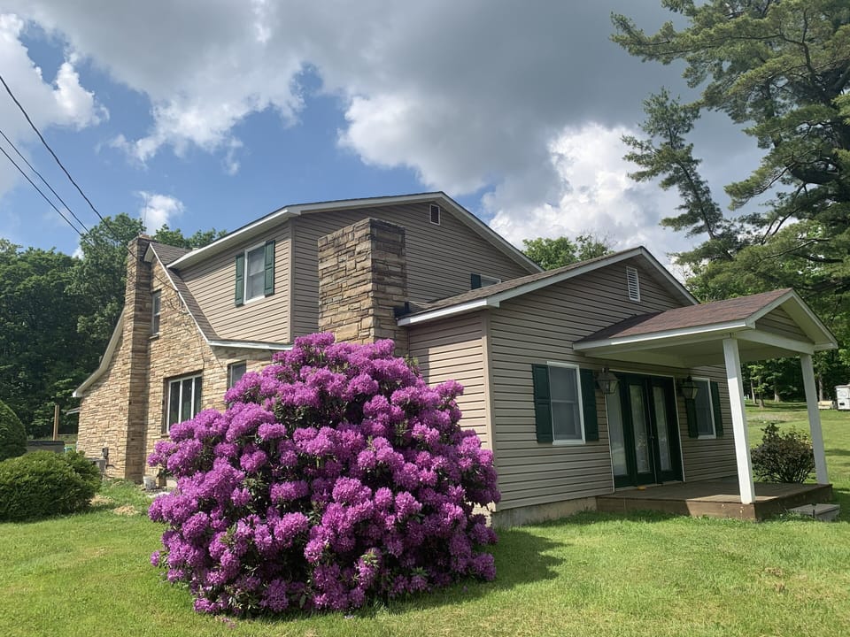 Side porch with a lot of outdoor space