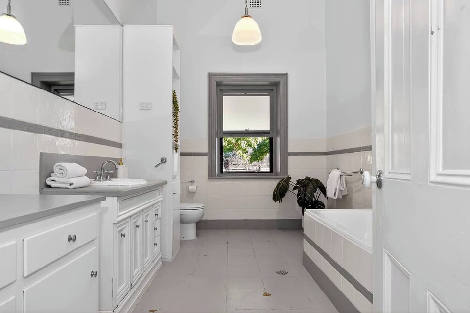 The family bathroom is centrally located and thoughtfully appointed to service all five bedrooms.