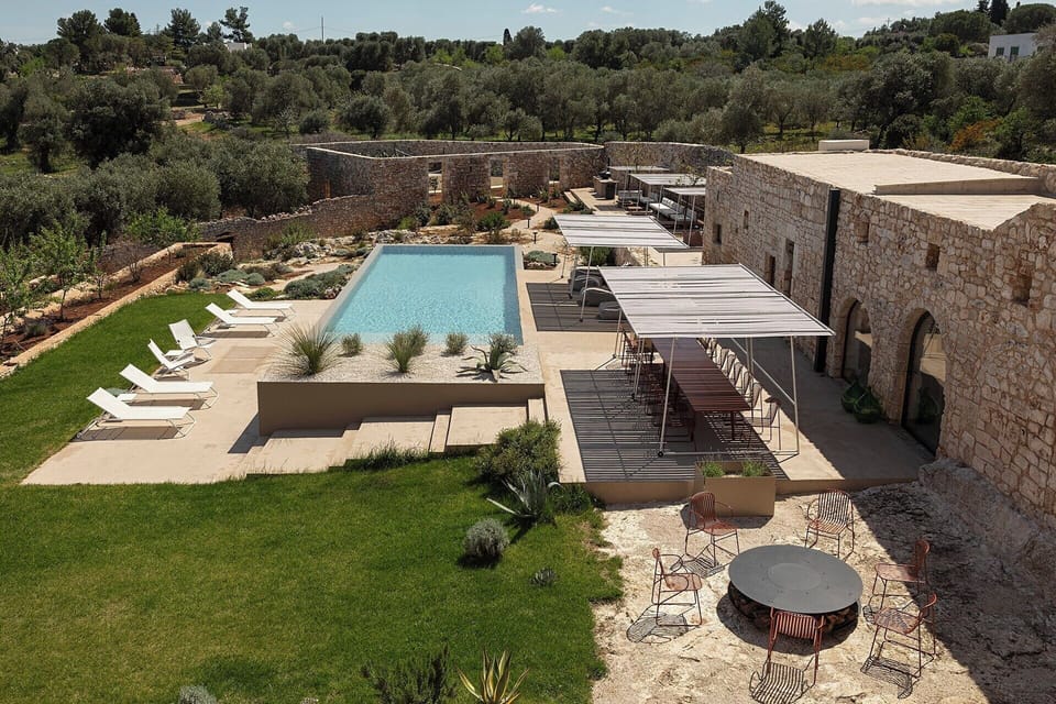 Masseria Belvedere's beautiful walled gardens and pool area.