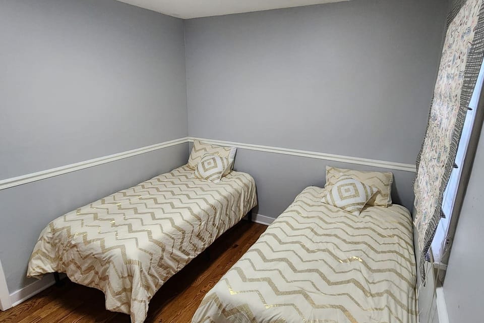 Twin bedroom perfect for kids, friends, or flexible sleeping arrangements.