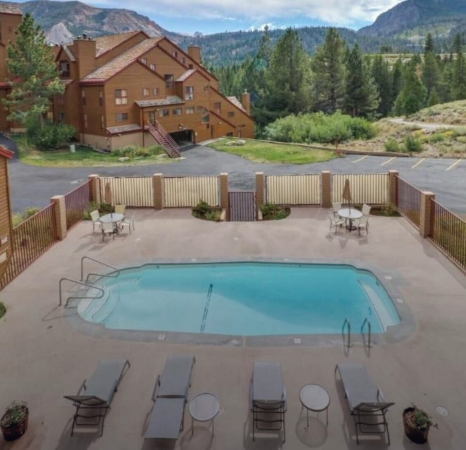 Relax in our shared summertime pool while soaking in breathtaking Mountain Views