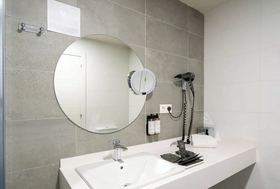 Get ready with bright lighting, plush towels, and premium amenities.