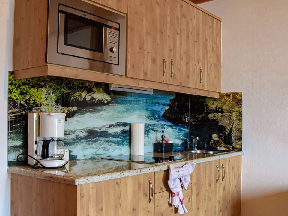 Countertop, Kitchen, Cabinetry, Paint, Wood Stain, Modern Art, Drawer