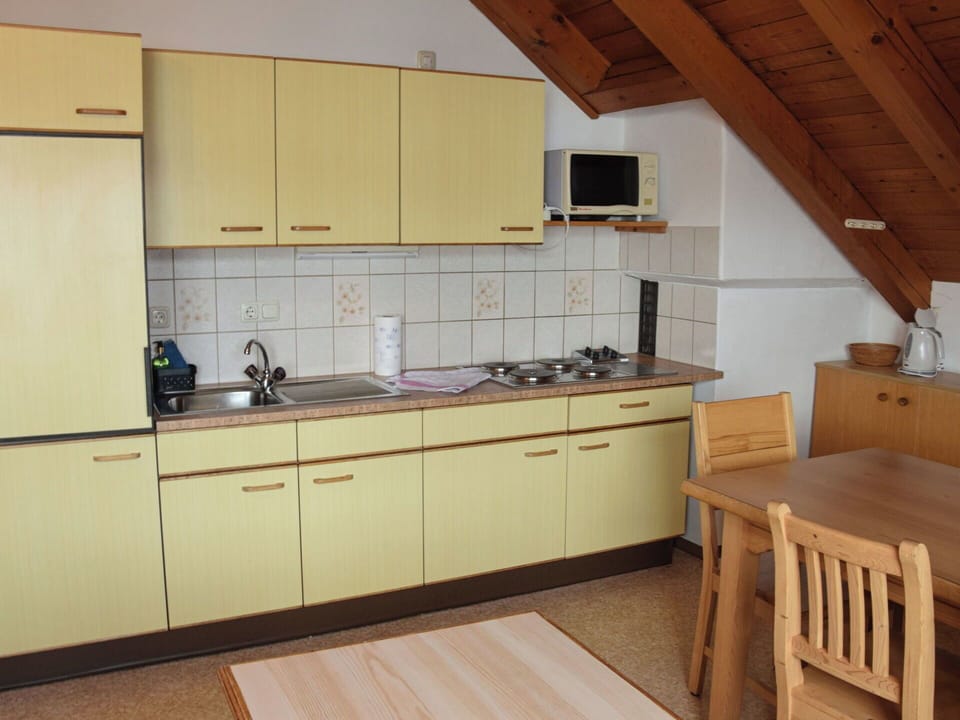 Wood, Flooring, Kitchen, Interior Design, Furniture, Floor, Countertop, Sink, Cabinetry, Room