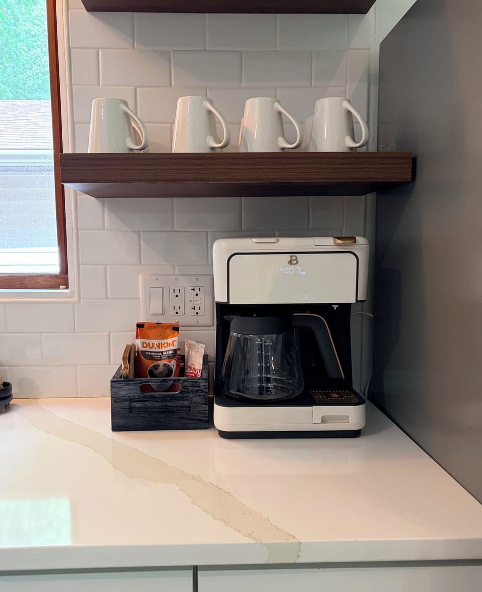 Coffee Maker with plenty of mugs for everyone. We supply the filters for your stay and coffee for your first morning!