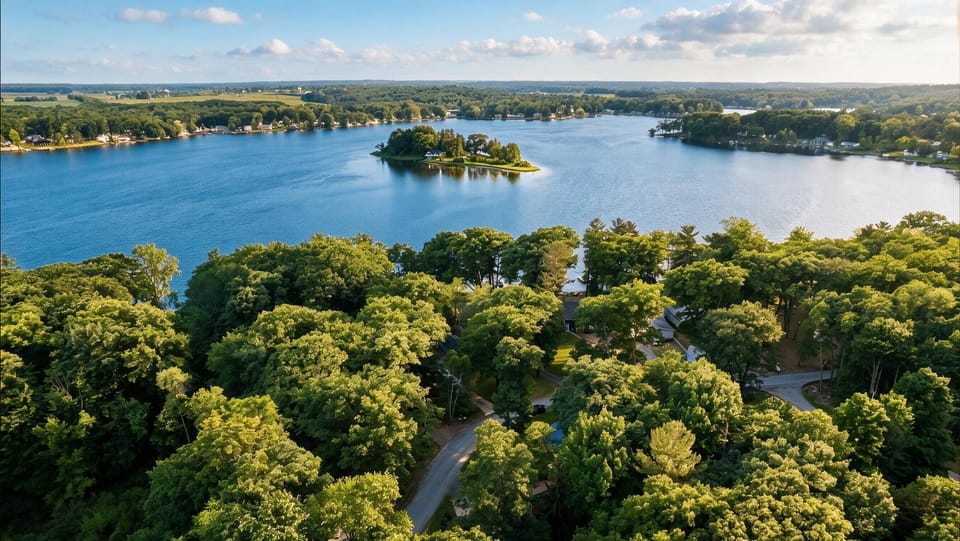 Scenic lakefront retreat with wooded views and a charming island backdrop