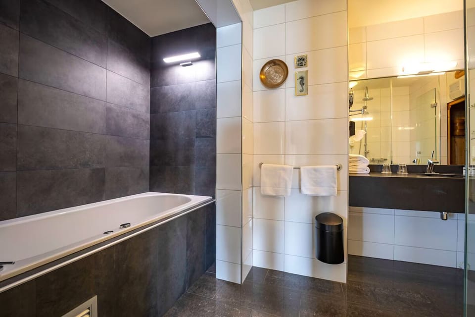 Breathe in sweeping sea views from your private balcony.