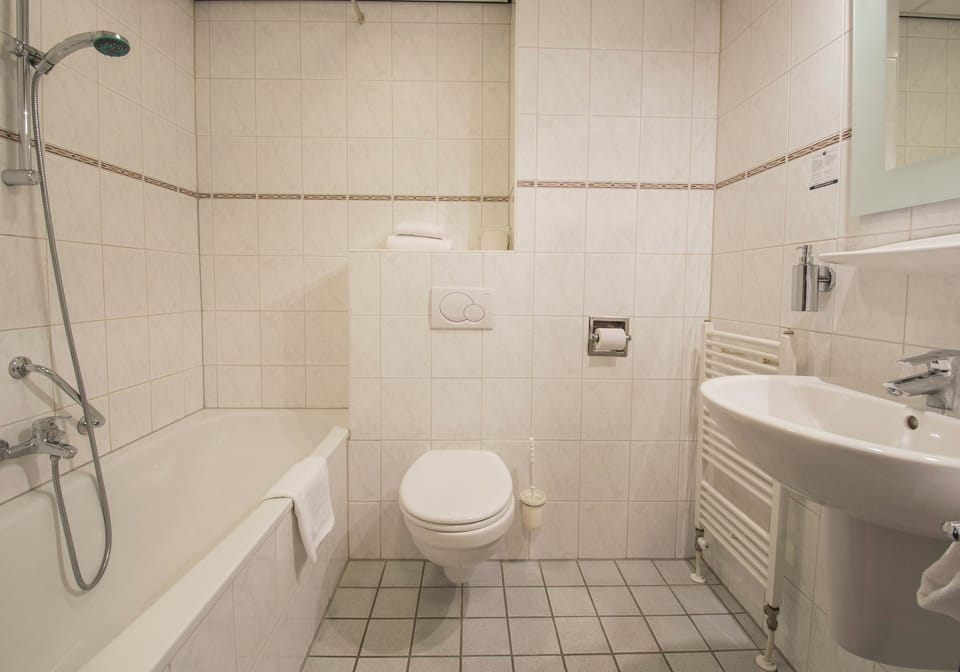 Refresh in a spotless bath with shower-tub comfort.